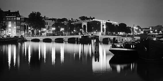 Magere Bridge and River Amstel at Night